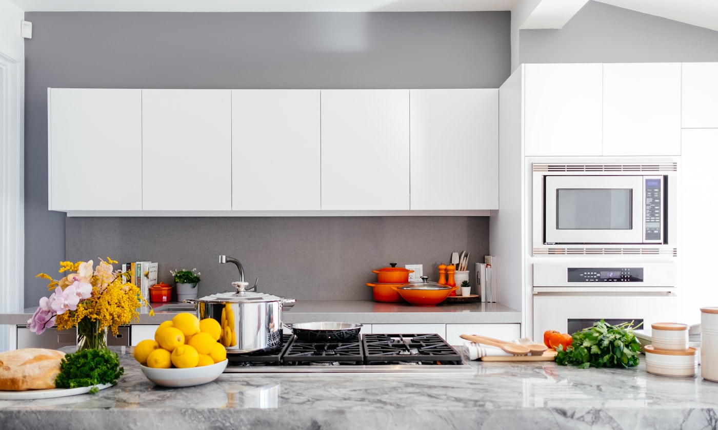 The kitchen as an entertaining command center: layout, light, and flow that scale
